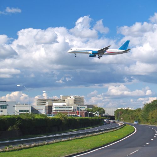 Aircraft Landing at London's Gatwick Airport. Showing the South terminal and road tunnel.